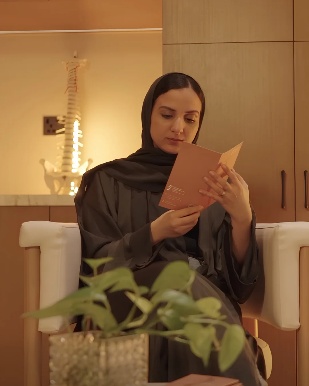 A patient in the waiting area at Fujairah Chiropractic Clinic
